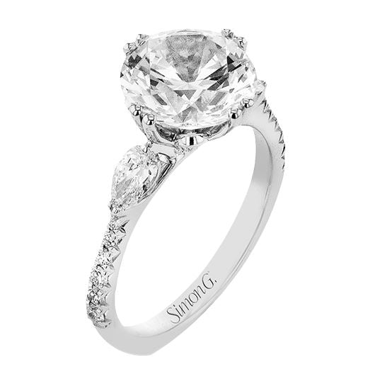 Lady's White 18 Karat 3 Stone Engagement Ring Size 6.5 With 0.25Tw Round G/H Si2 Diamonds And 0.40Tw Pear G/H Si2 Diamonds