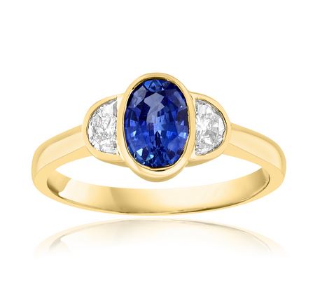 Lady's Yellow 18 Karat Bezel Fashion Ring Size 6.5 With One = 0.98Ct Oval Sapphire And 2 = 0.28Tw Various Shapes H Si1 Diamonds