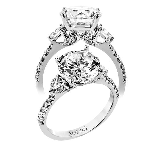 Lady's White 18 Karat 3 Stone Engagement Ring Size 6.5 With 0.21Tw Round G/H Si2 Diamonds And 0.48Tw Round G/H Si2 Diamonds