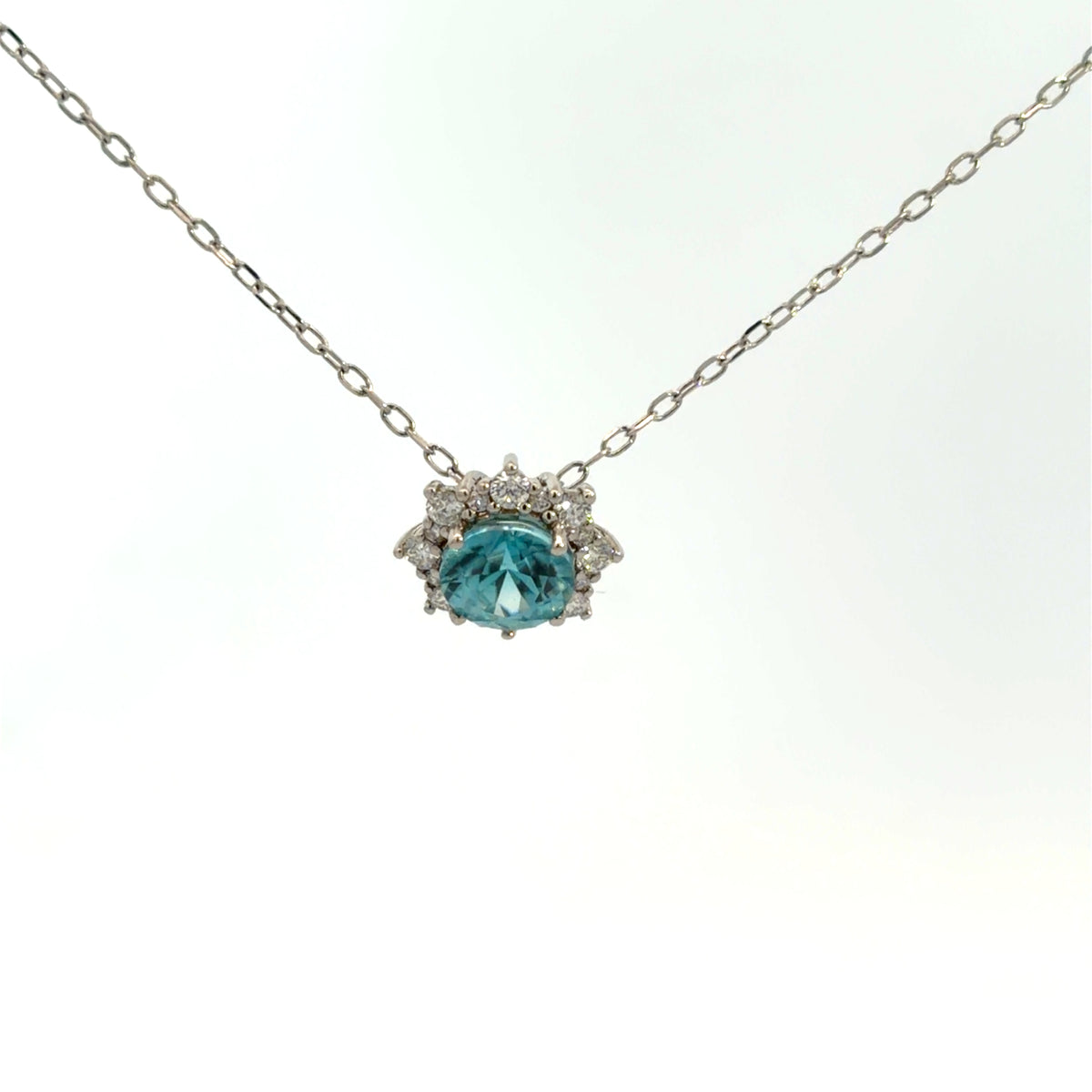 Lady's White 14 Karat Halo Pendants Length 18 With One = 1.26Ct Round Zircon And = 0.20Twt Round H/I Si2 Diamonds