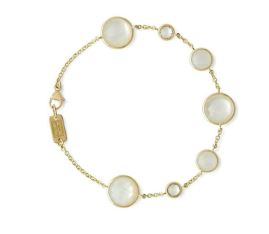 Lady's White 18 Karat Station Bracelet With 7= Various Shapes Others