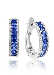 Lady's White 14 Karat Medium Hoop Earrings With 22 1.84Tw Emerald Sapphires And 92 0.36Tw Round G/H Si2 Diamonds