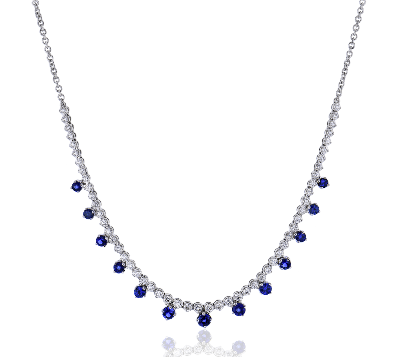Lady's White 18 Karat Station Necklace Length 18 With = 1.17Twt Round Sapphires And 54 = 0.97Twt Round G Vs1 Diamonds