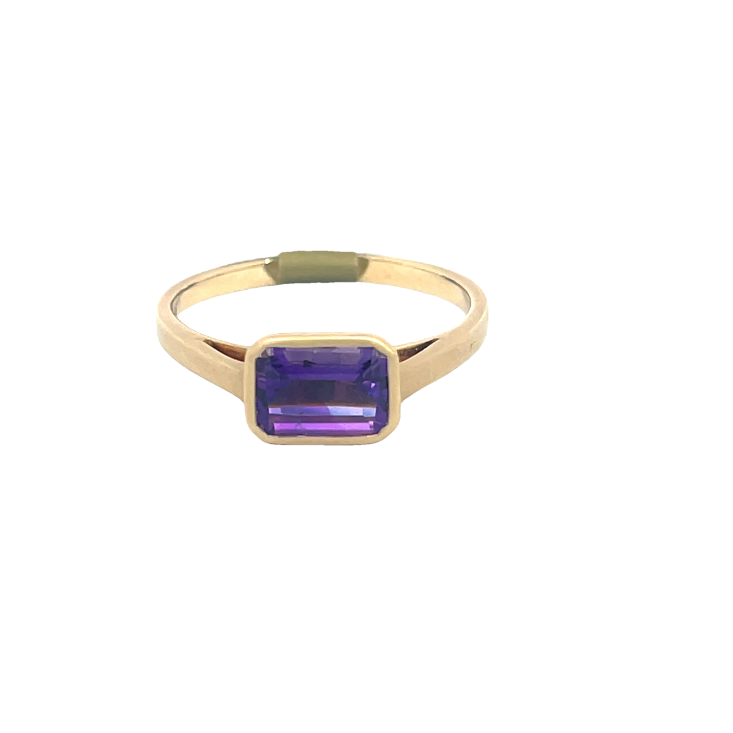 Lady's Yellow 14 Karat Bezel Fashion Ring Size 6.5 With One 0.96Ct Emerald Amethyst
