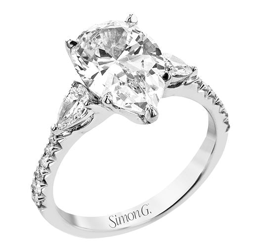 Lady's White 18 Karat 3 Stone Engagement Ring Size 6.5 With 0.15Tw Round G/H Si2 Diamonds And 0.37Tw Pear G/H Si2 Diamonds