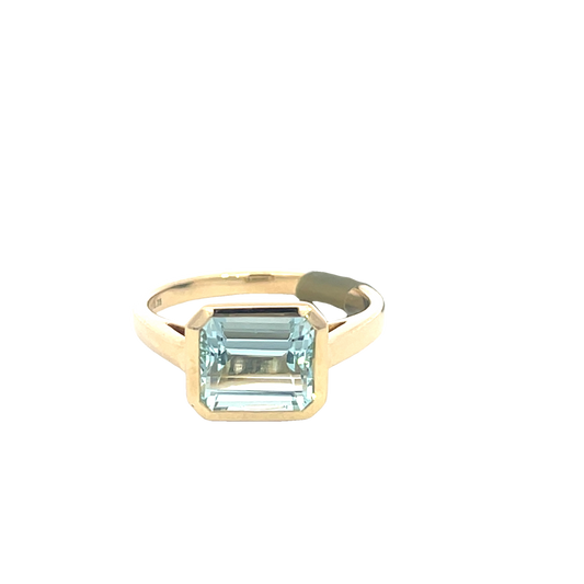 Lady's Yellow 14 Karat Aqua Bezel Fashion Ring