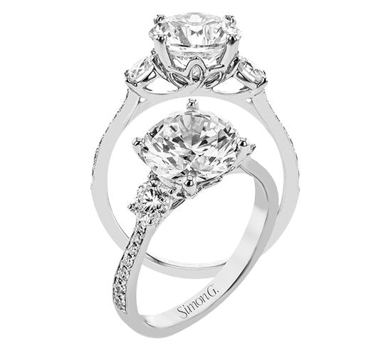 Lady's White 18 Karat 3 Stone Engagement Ring Size 6.5 With 0.13Tw Round G/H Si2 Diamonds And 0.48Tw Round G/H Si2 Diamonds
