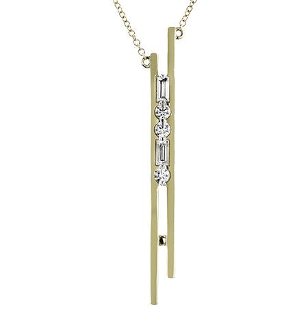 Lady's Two-Tone 14 Karat Bar Necklace Length 18 With 3 = 0.11Tw Round G Vs1 Diamonds And 2 = 0.13Tw Baguette G Vs1 Diamonds