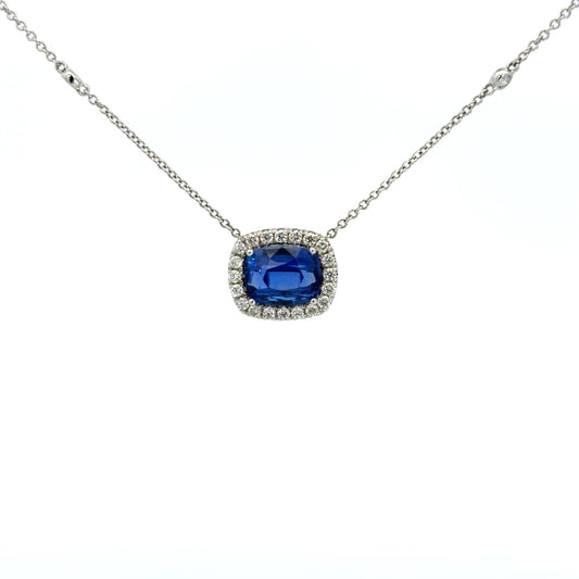 Lady's White 18 Karat Halo Necklace Length 18 With One = 3.04Ct Cushion Sapphire, 6 = 0.15Twt Round G/H Si2 Diamonds And 0.31 Twt Other Stones