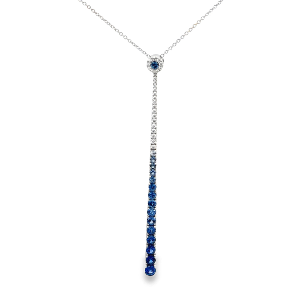 Lady's White 18 Karat Drop Pendants Length 18 With 16 = 1.50Twt Round Sapphires And 26 = 0.20Twt Round H Si1 Diamonds