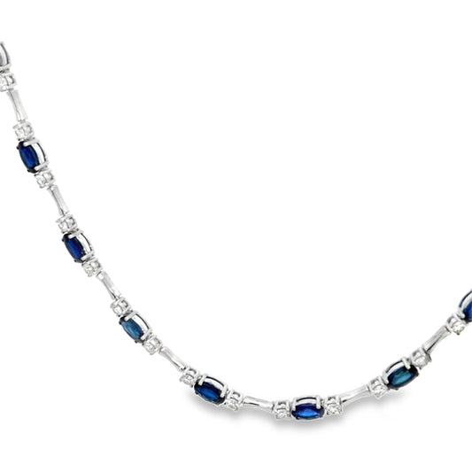 Lady's White 18 Karat Riviera Necklace Length 18 With 13 = 7.19Twt Oval Sapphires And 26 = 1.83Twt Round G/H Si2 Diamonds
