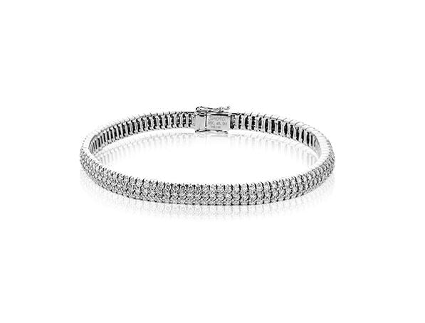 Lady's White 18 Karat Tennis Bracelet Length 7 With 495 = 5.00Tw Round G Vs1 Diamonds